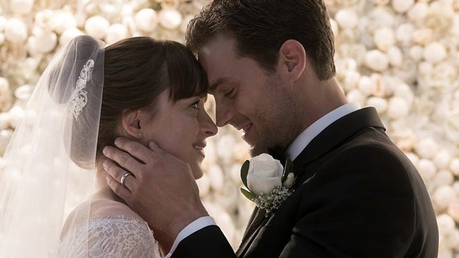 Dakota Johnson and Jaime Dornan star in “Fifty Shades Freed.” Contributed by Universal Pictures
