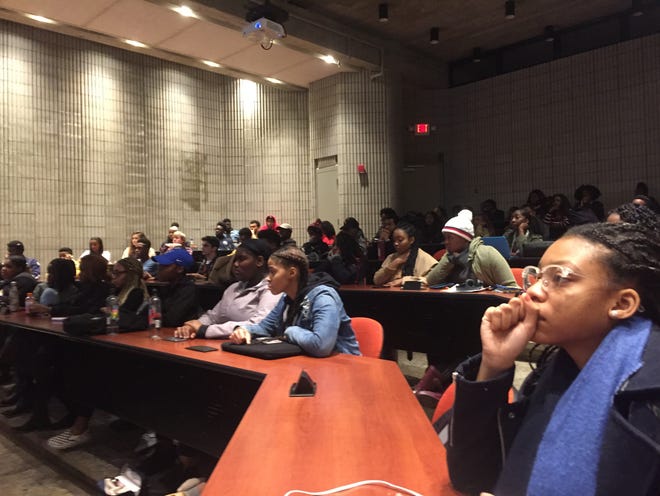 Students at UMass Dartmouth listened to a presentation about the revocation of a student's admission to UMD, which students said happened because of his history with gangs. [Jennette Barnes/The Standard-Times]