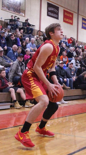Reading's Cole Boyd dials up a 3-point attempt during the Rangers' game at Homer. [MATTHEW LOUNSBERRY PHOTOS]