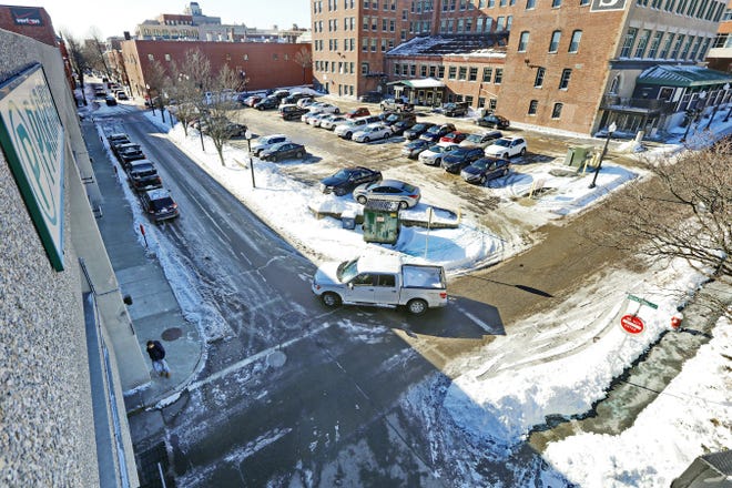 A truck rounds the bend on Frederick Douglass Way, which starts at Pleasant Street and curves past the parking garage ending at Elm Street in downtown New Bedford. 

[ PETER PEREIRA/THE STANDARD-TIMES/SCMG ]
