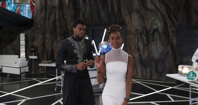 King T’Challa gets a science lesson from his little sister Shuri. [Walt Disney Pictures]