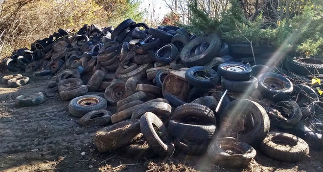 The Plymouth County Mosquito Control Project removed close to 4,000 tires from this Norwell site at 271 Washington St. in the last few months. Photo: Wicked Local Norwell