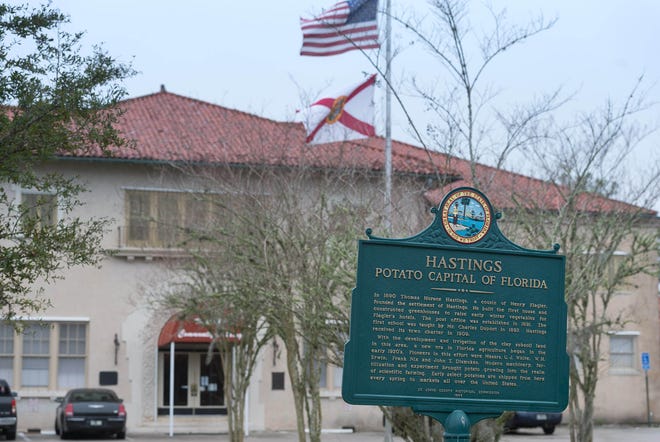 A sign telling the history of Hastings sits in front of town's government office and community center on Tuesday. Established in 1909, Hastings is headed for dissolution at the end of the month, at which time St. Johns County will take over operations. [PETER WILLOTT/THE RECORD]