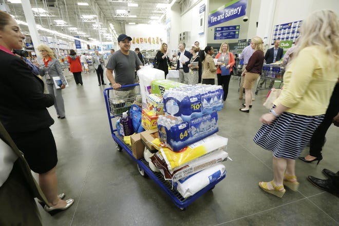 Sam's Club is closing some stores and turning them into shipping centers to speed deliveries. [AP ARCHIVE]