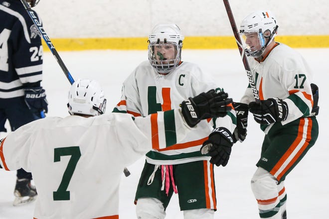 Hopkinton's Will Abbott (center) celebrates after scoring during the Hillers' 2-0 win over Medway at the New England Sports Center in Marlborough on Wednesday.