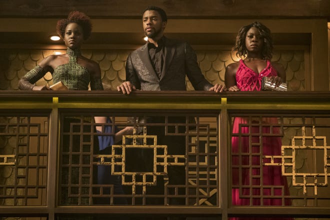 Lupita Nyong'o, from left, Chadwick Boseman and Danai Gurira star in "Black Panther." [Courtesy photo Matt Kennedy/Marvel Studios-Disney via AP]