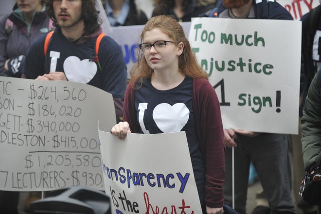 University of New Hampshire student Shaelyn Frost was among those who rallied Friday morning to show support for lecturers whose contracts will not be renewed after the current semester. [John Huff/Fosters.com]