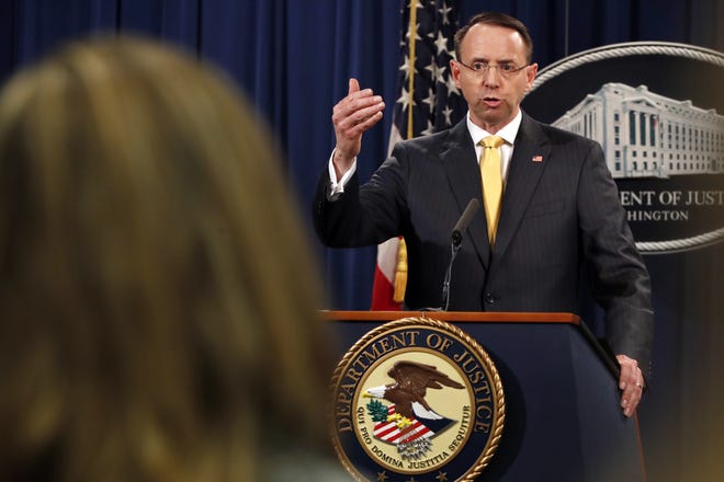 Deputy Attorney General Rod Rosenstein answers a question after announcing that the office of special counsel Robert Mueller announced a grand jury has charged 13 Russian nationals and several Russian entities, Friday, Feb. 16, 2018, in Washington. The defendants with an elaborate plot to interfere in the 2016 U.S. presidential election. (AP Photo/Jacquelyn Martin)