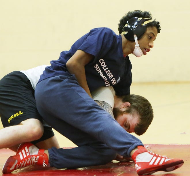 New Bedford High wrestler Wilson Gomes, shown here in practice, reached the 106-pound finals at the Div. 1 State Championships on Saturday. He advances to All-States next weekend. [MIKE VALERI/THE STANDARD-TIMES/SCMG]