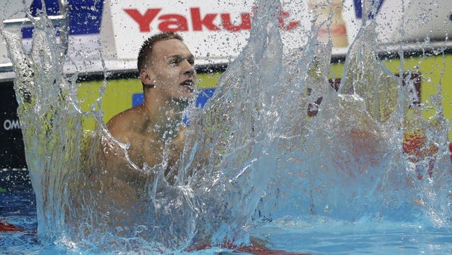 Former Clay High School swimmer Caeleb Dressel, pictured in a file photo from the FINA World Championships in July, set an American breaststroke record Saturday. [AP Photo/Petr David Josek]