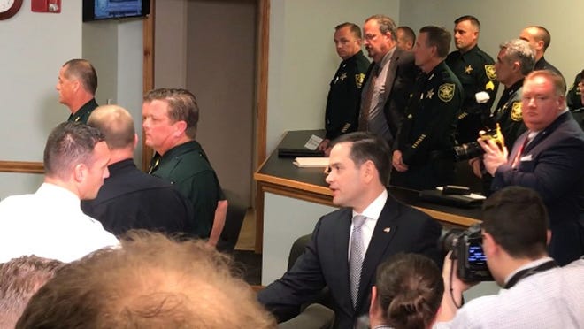 Florida Sen. Marco Rubio meeting Friday night with law enforcement officers who responded to the mass shooting at Marjory Stoneman Douglas High School. (George Bennett/The Palm Beach Post)