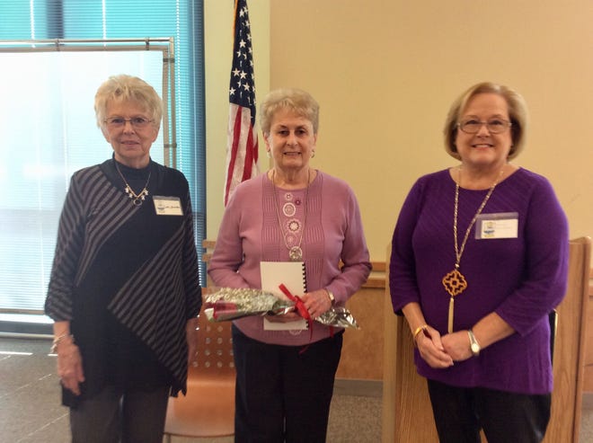Cookie Sanders, Woman's Club of Hopewell member, and Nancy Danielson, club president, welcomes new member, Carole Everets, center, during a recent club meeting. [Contributed Photo]