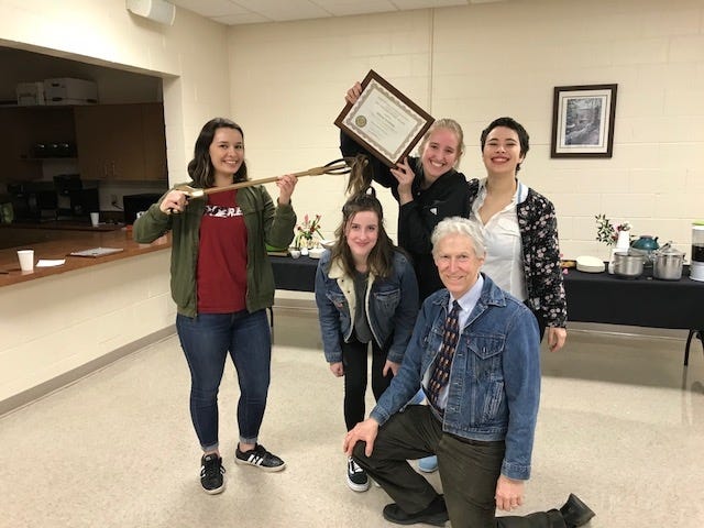 Athens Academy seniors Glynn Chesser, Eva Houser, Caroline Kuhnert, and Sofy Bertioli pose with Dr. Lawrence Stueck and the SEED club's Keep Oconee Beautiful award. (Contributed)