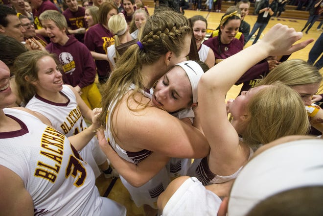Stockton's Emily Offenheiser, left, and Aspyn Stewart congratulate each other after defeating Walther Christian Academy in the 1A supersectionals on Monday, Feb. 19, 2018. [ARTURO FERNANDEZ/RRSTAR.COM & THE JOURNAL-STANDARD STAFF]