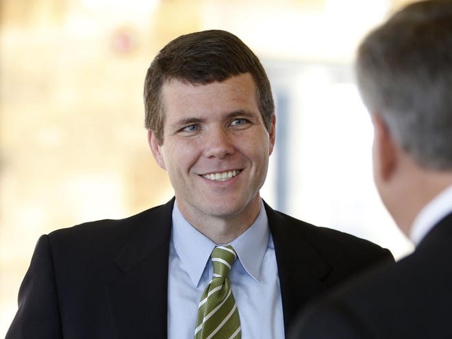 Mayor Walt Maddox, left, visits with State Rep. Gerald Allen, right, at the Legislative Breakfast hosted by the city of Tuscaloosa on Dec 12, 2013, at the River Market in Tuscaloosa. [Staff file photo]