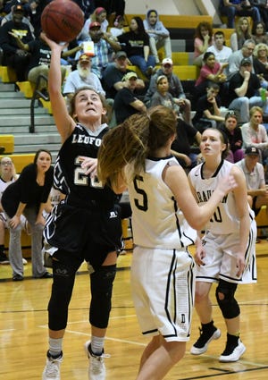 Ledford's Ashley Anthony shoots against Draughn. [Mike Duprez/The Dispatch]