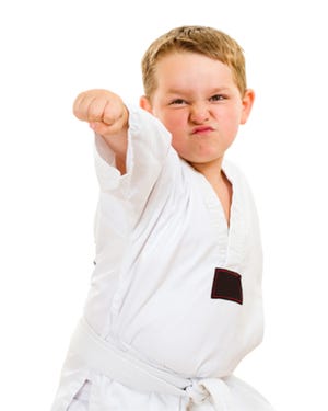 With Taekwondo, kids think they are just learning how to masterfully break a board, when they are really exercising. [TRIBUNE NEWS SERVICE]