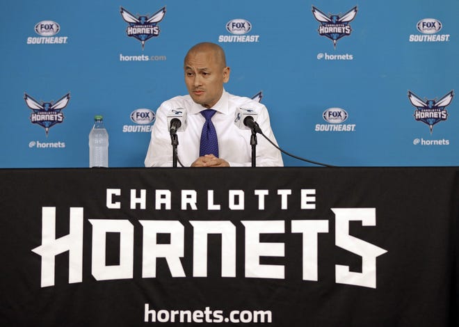 FILE - In this April 13, 2017, file photo, Charlotte Hornets general manager Rich Cho speaks to the media during a news conference in Charlotte, N.C. The struggling Hornets have fired general manager Rich Cho. Team owner Michael Jordan announced the news in a release Tuesday, Feb. 20, 2018, saying þÄúweþÄôre deeply committed to our fans and to the city of Charlotte to provide a consistent winner on the court. The search will now begin for our next head of basketball operations who will help us achieve that goal.þÄù(AP Photo/Chuck Burton, File)