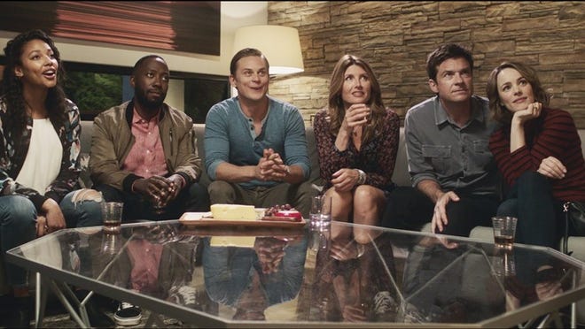 From left, Kylie Bunbury, Lamorne Morris, Billy Magnussen, Sharon Horgan, Jason Bateman and Rachel McAdams in “Game Night.” The secondary characters aren’t developed enough to keep things interesting. Contributed by Warner Bros. Pictures