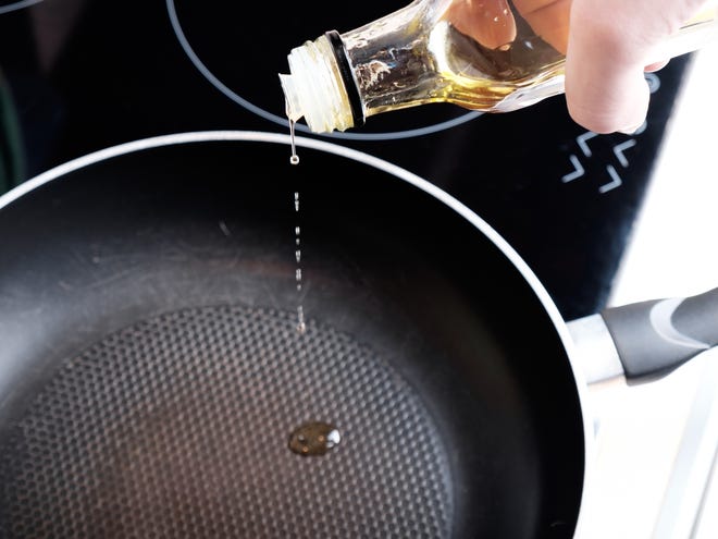 Sauteing begins with a hot pan and a little oil. You should hear a sizzle as the oil meets the moisture of the meat or vegetables you are adding to the pan. [ISTOCK]