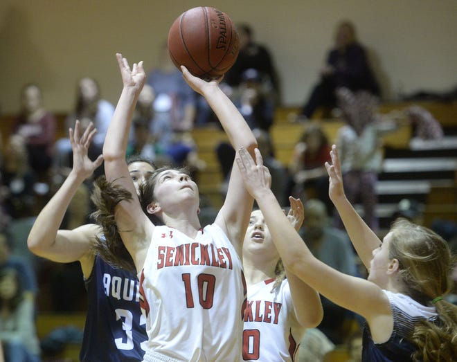 Sewickley's Theresa Wilson shoots during a WPIAL Class 1A quarterfinal game against Aquinas Academy on Friday night at Northgate High School.

[Sally Maxson/BCT staff]