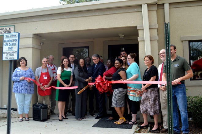 Michelle Flores/Bluffton Today Officials cut the ribbon on Bluffton Self Help’s new Education and Resource Center.
