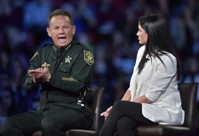 use photo at 3 cols. 



Wednesday night, Broward Sheriff Scott Israel attended a CNN town hall on guns in Sunrise, Fla., along with NRA spokeswoman Dana Loesch, Parkland students and parents and others. Thursday, an emotional Israel had to announce that one of his deputies had failed to confront the gunman last week at Marjory Stoneman Douglas High School. [Michael Laughlin/South Florida Sun Sentinel]