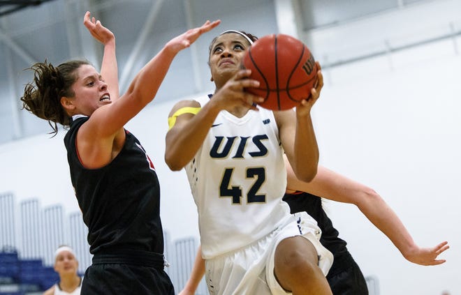 University of Illinois Springfield's Destiny Ramsey (42) drives up to the basket against University of University of Maryville's Amanda Ponce (5) in the second half at UIS' TRAC facility, Thursday, Feb. 22, 2018, in Springfield, Ill. [Justin L. Fowler/The State Journal-Register]