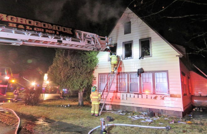Firefighters at the scene of a fire Monday night at 22 W. Main St., in Port Jervis. View more photos at recordonline.com/photos. [SHARON SIEGEL/FOR THE TIMES HERALD-RECORD]