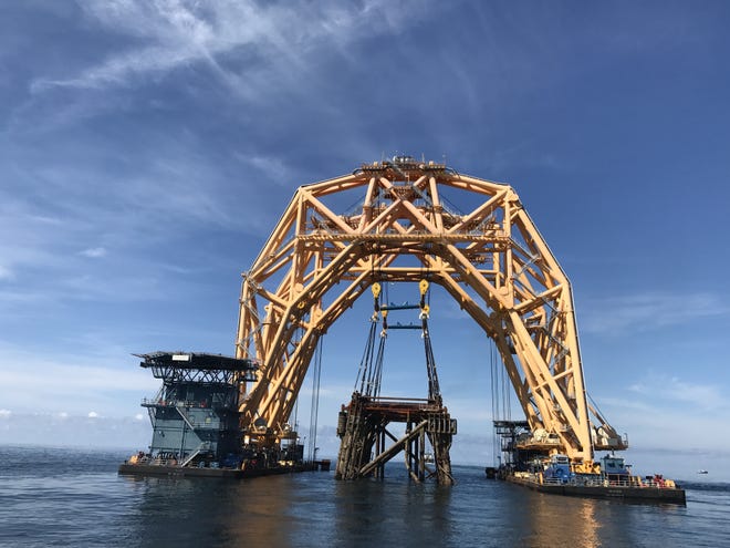 Shell used a specially designed vessel to lift and move the 350-foot-tall, 3,000-ton jacket to be put in place as an artificial reef. [Submitted]