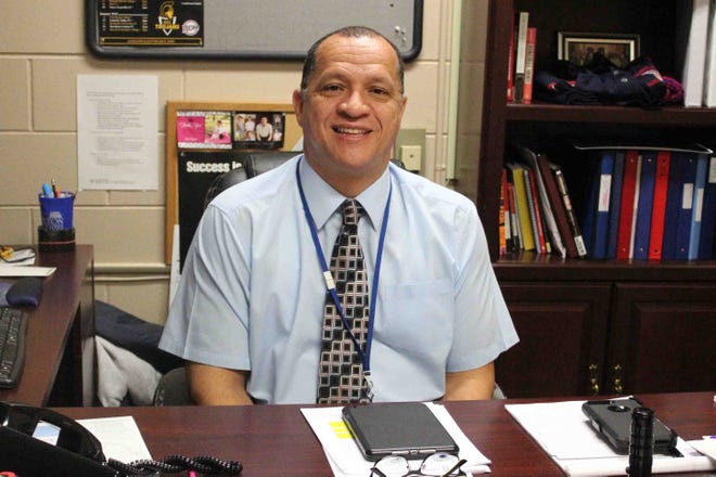John Thomas Jr. strives to make a difference in the lives of students through his positions as head varsity boys basketball coach, assistant principal and CTE director at Colonial Heights High School. [Kelsey Reichenberg/progress-index.com]