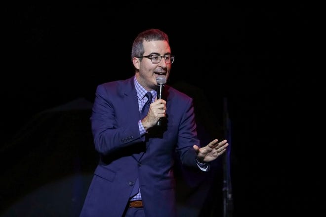Comedian John Oliver performs at the 11th Annual Stand Up for Heroes benefit in New York on Nov. 7, 2017. (Photo by Brent N. Clarke/Invision/AP, File)