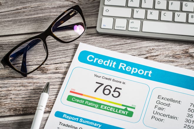 Your personal credit score won't automatically drop if you marry a spouse with a bad credit score. [iSTOCK]