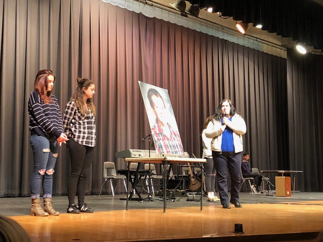 Jennifer Higgins, right, who lost her son, Joshua, to suicide, shares her story at a MWAH! Performing Arts Troupe presentation at Morrison High School on Monday, Feb. 26, 2018. [DERRICK MASON/THE JOURNAL-STANDARD STAFF]