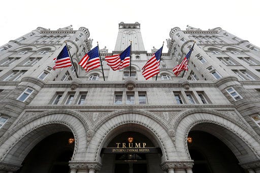 FILE - In this Dec. 21, 2016, file photo, the Trump International Hotel on Pennsylvania Avenue in Washington. A Trump Organization executive says the company has donated an undisclosed amount of profits from foreign government patrons at its hotel properties to the U.S. Treasury, but won't say how much. (AP Photo/Alex Brandon, File)