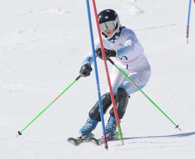 Katie Carrier of Victor makes her first run in the NYSPHSAA alpine championships at Bristol Mountain during the slalom race Monday morning. [Jack Haley/Messenger Post Media]
