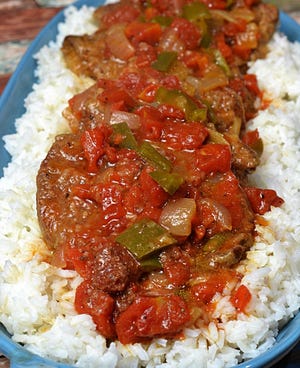 Swiss steak is one of those things everyone — even the most unenthusiastic cooks — should know how to make. [ladybehindthecurtain.com]