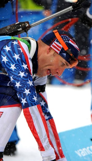 Sgt. Jeremy Teela of the U.S. Army World Class Athlete Program catches his breath after finishing ninth in the Olympic men's 10-kilometer sprint in the 2010 Winter Games at Whistler Olympic Park in Callaghan Valley, British Columbia, Canada. [TIM HIPPS/FMWRC PUBLIC AFFAIRS]