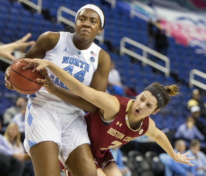 Boston College's Andie Anastos, right, reaches in against North Carolina's Janelle Bailey during an NCCA college basketball game in the American Athletic Conference tournament, Wednesday, Feb. 28, 2018 in Greensboro, N.C. (H. Scott Hoffman/News & Record via AP)
