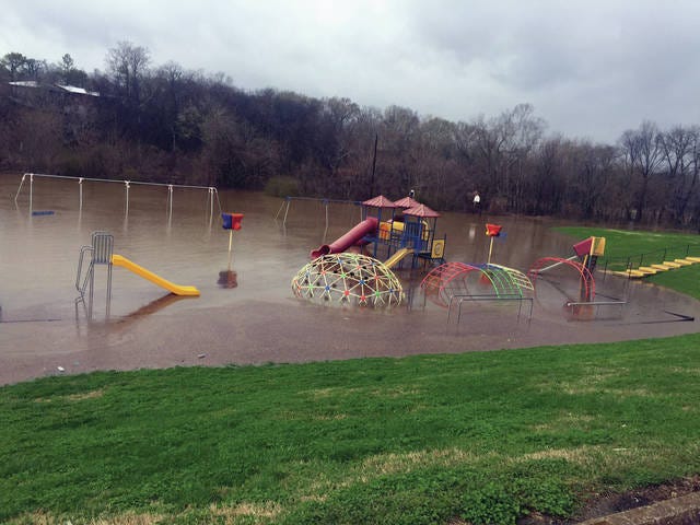 Riverside Elementary School's playground fills with water from the Duck River on Thursday. (Courtesy photo by Andy Wilhoite)