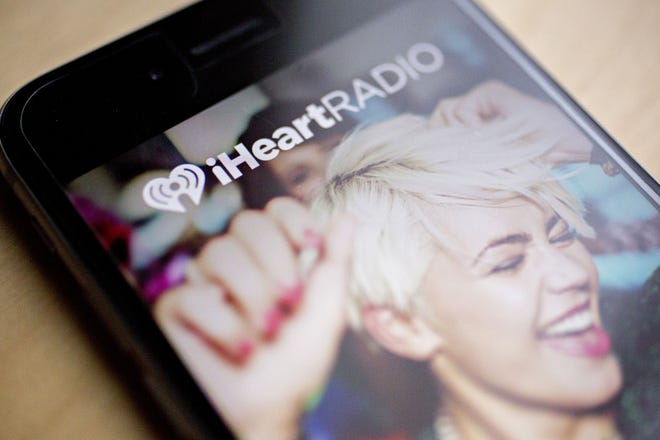 The iHeartMedia application is displayed for a photograph on an iPhone in Washington, D.C., on March 1, 2018. MUST CREDIT: Andrew Harrer/Bloomberg