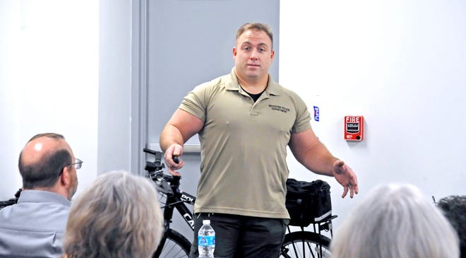 Wooster Police Department Sgt. Clint Bartolic talks to the members of this year's Citizens' Police Academy about the department's bike patrol division.