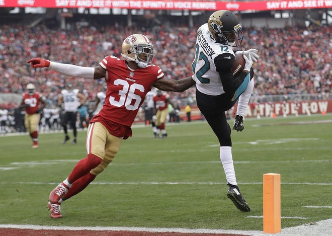 Jaguars receiver Dede Westbrook (12) catches a pass in front of San Francisco 49ers cornerback Dontae Johnson in the teams' Week 16 game in 2017. [AP Photo/Marcio Jose Sanchez]