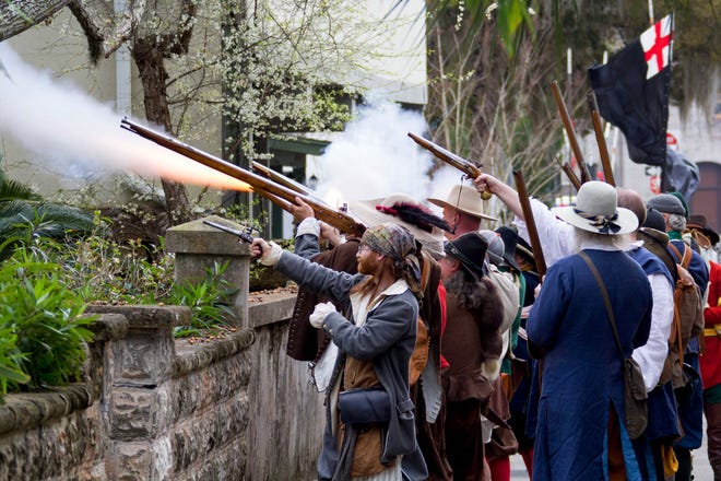 English privateers fire at Spanish militia during the annual reenactment of Captain Robert Searle's 1668 raid of St. Augustine in downtown St. Augustine. [File]