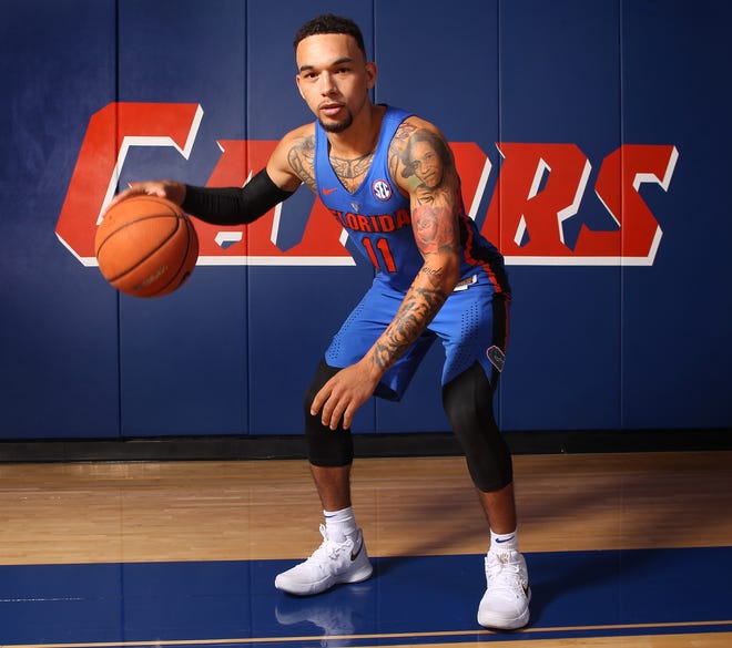 Florida senior guard Chris Chiozza is on the verge of becoming the school's all-time assist leader. He needs one to pass Erving Walker, who has 547. [Brad McClenny/Staff photographer]