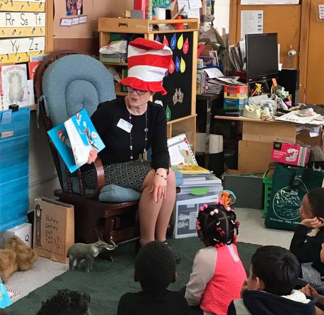 Celebrity reader Kathleen O'Keefe reads to a class of Dr. Seuss fans. [Photo provided]