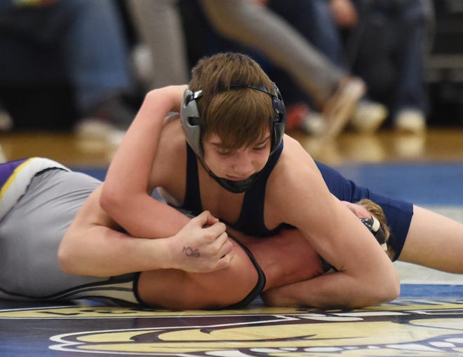 Mike Prikryl of Rootstown controls James Klingman of Berkshire during their matchup on Friday at the Garfield Heights Division III District Tournament.