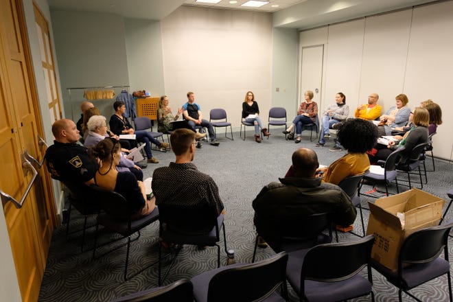 About 20 people gathered Sunday to discuss challenges facing Topeka's youth. [Katie Moore/The Capital-Journal]
