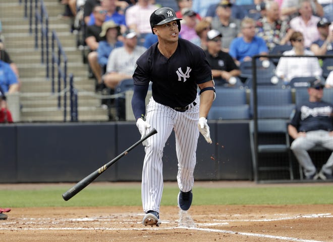 Yankees' Giancarlo Stanton, seen here on Friday, lost two flyballs in the sun and both fell for hits Sunday in a 9-1 loss to the Tampa Bay Rays. Stanton went 0-for-3 at the plate. [THE ASSOCIATED PRESS]