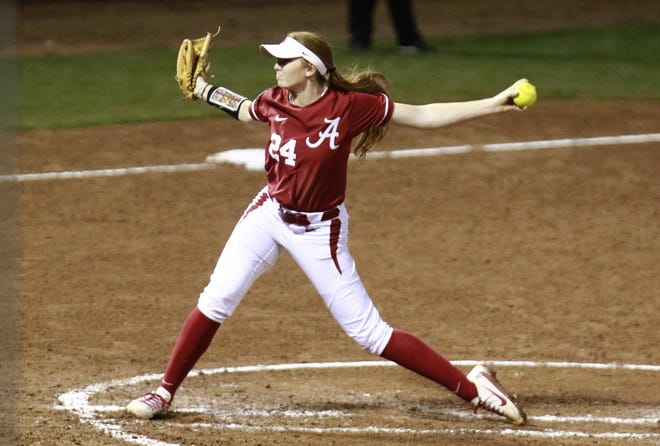 Alabama pitcher Madison Preston (24) winds up a pitch during the NCAA Softball game between the Alabama Crimson Tide and the Florida State Seminoles at Rhodes Stadium in Tuscaloosa, Ala. on Saturday, Feb. 24, 2018. [Photo/ Jake Arthur]